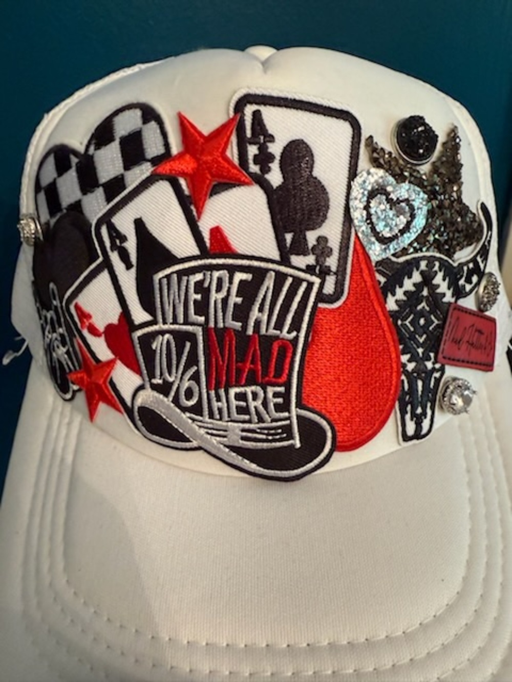 White Embellished 'We're All Mad Here' Baseball Cap